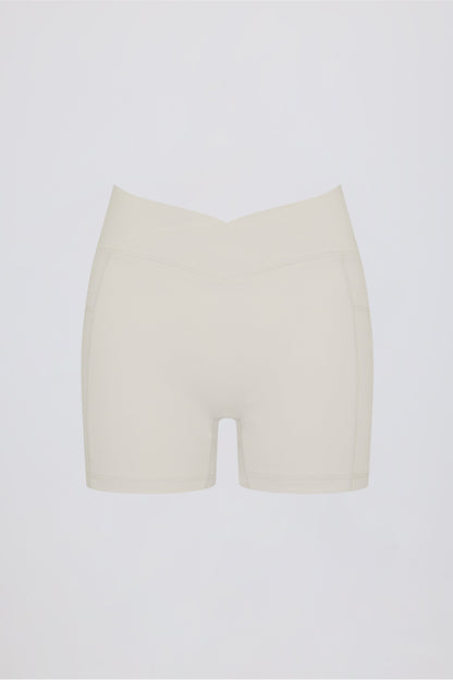 Soft Active Pocket V-Waist Mini Shorts in Cream